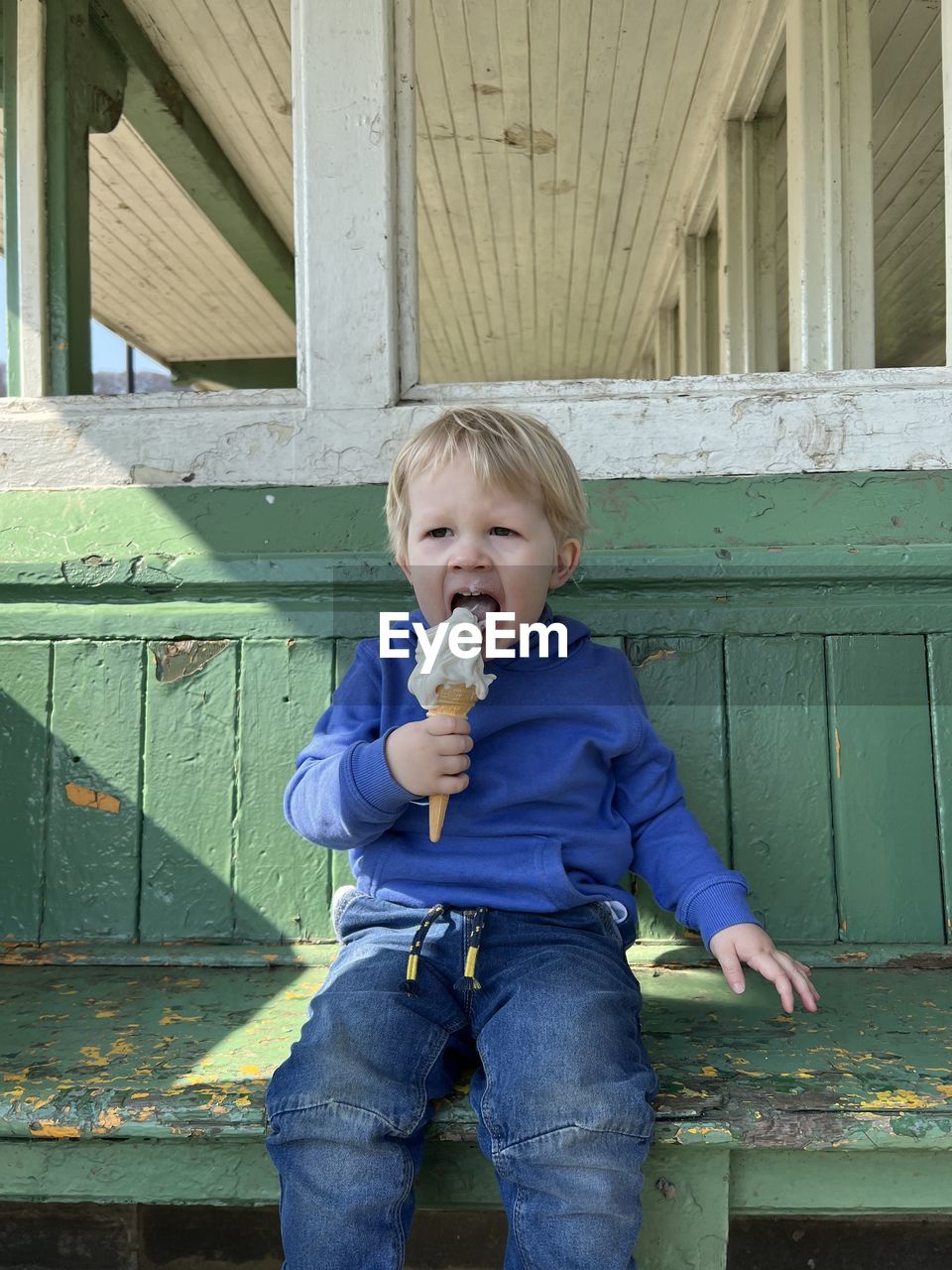 Toddler eats ice cream