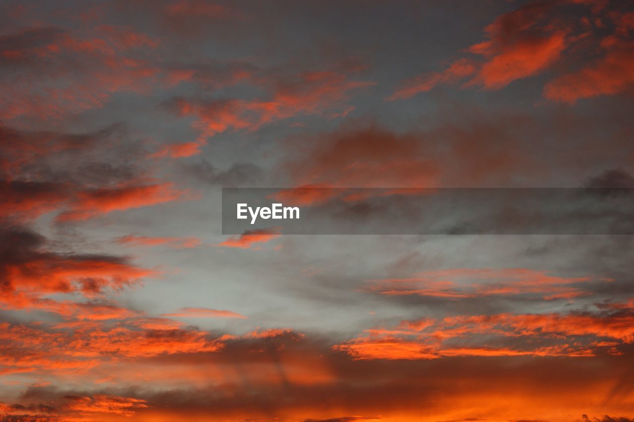 SCENIC VIEW OF CLOUDY SKY AT SUNSET