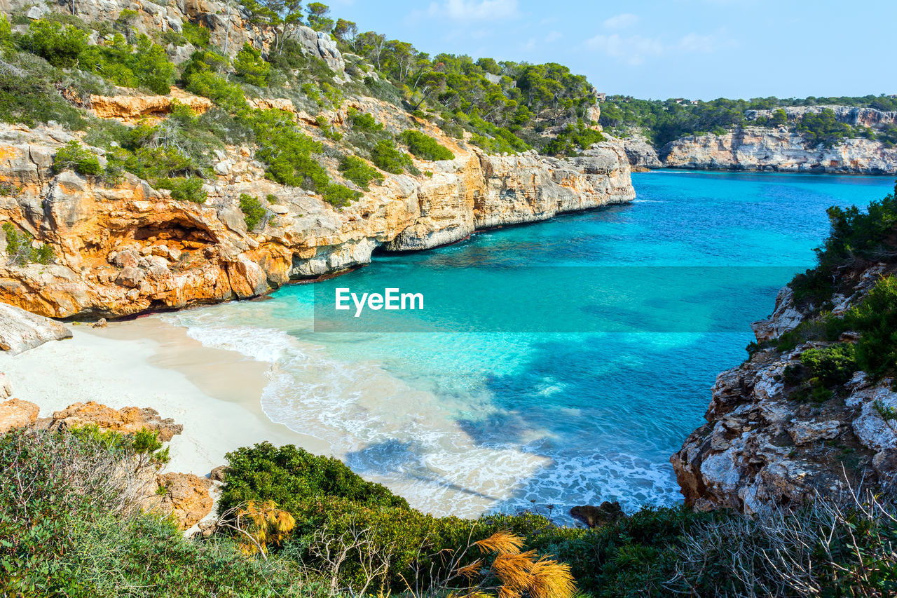 SCENIC VIEW OF ROCKS ON SEA