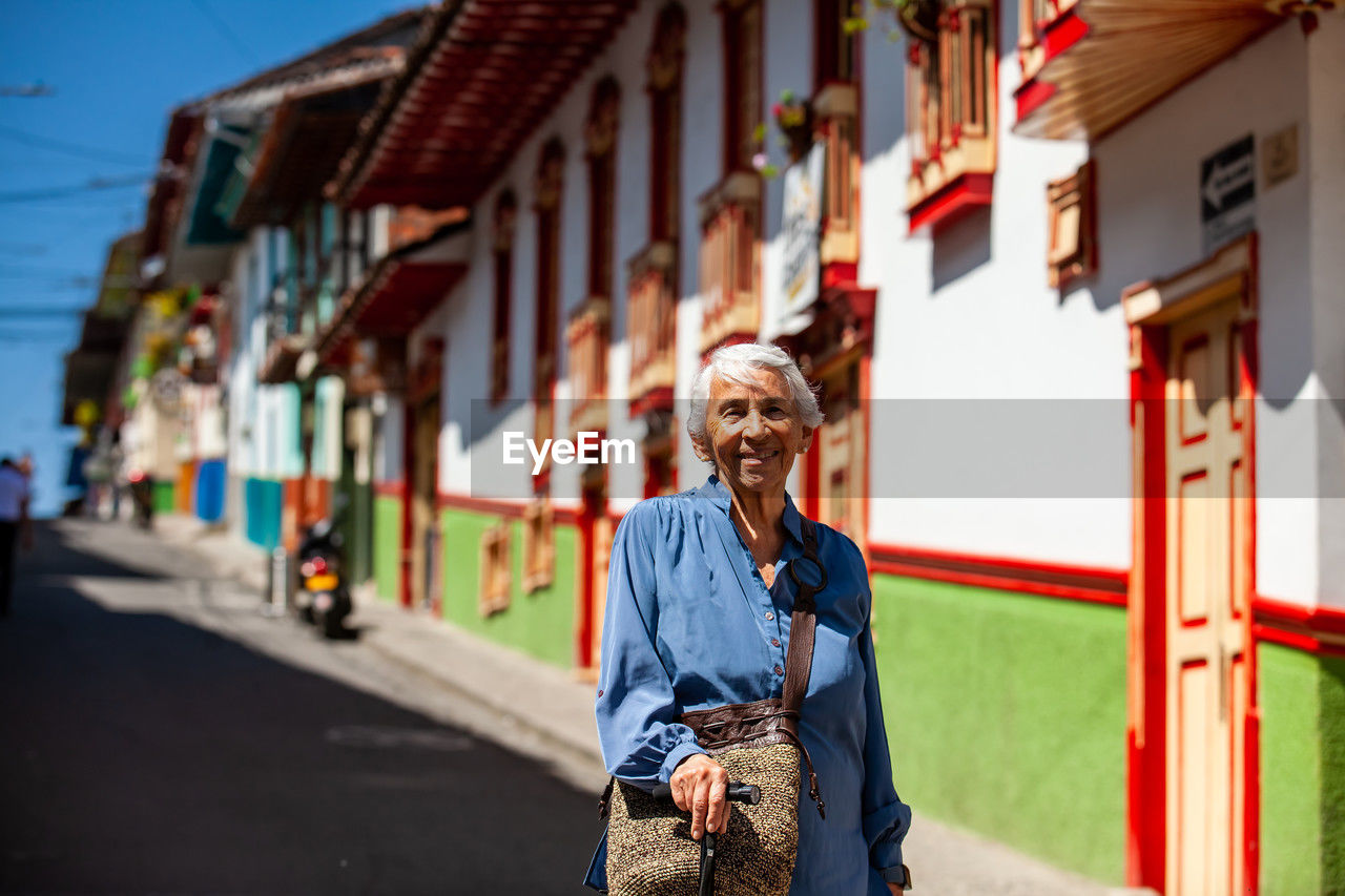 Senior woman tourist at the heritage town of salamina in the department of caldas in colombia