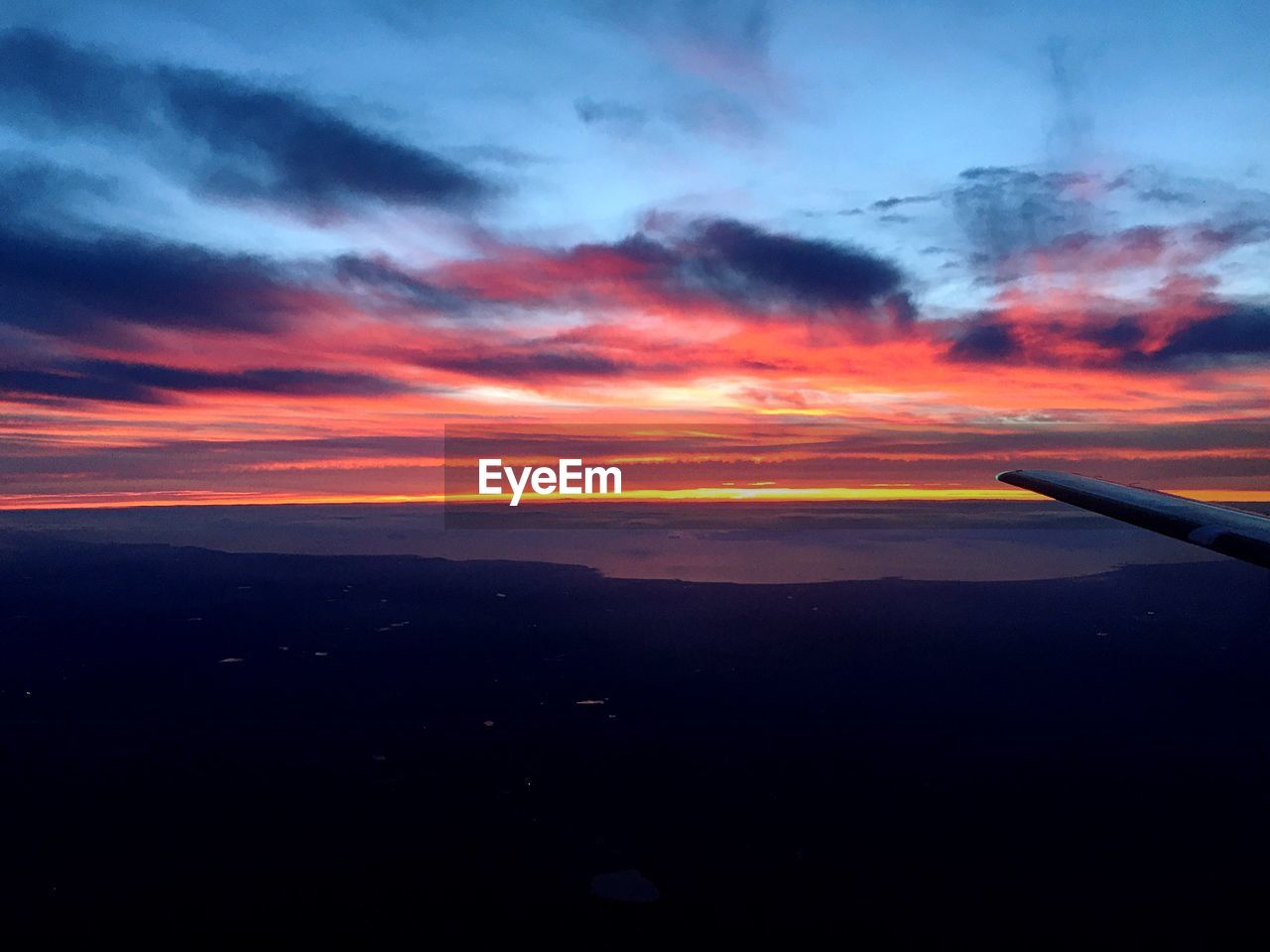 SCENIC VIEW OF DRAMATIC SKY DURING SUNSET