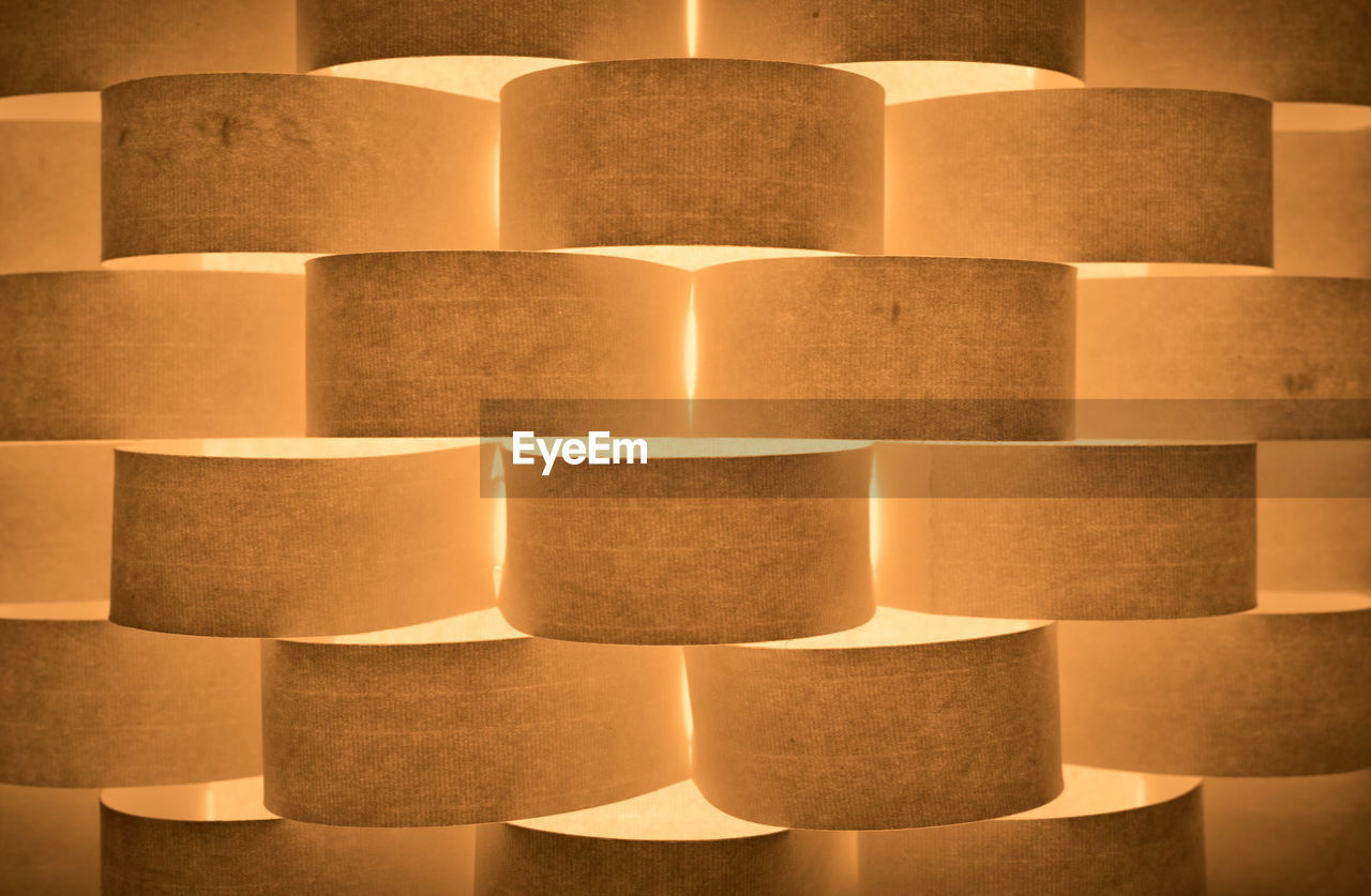 Full frame shot of illuminated brown wall
