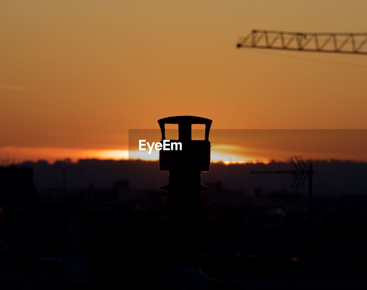 SILHOUETTE OF BUILDING AT SUNSET