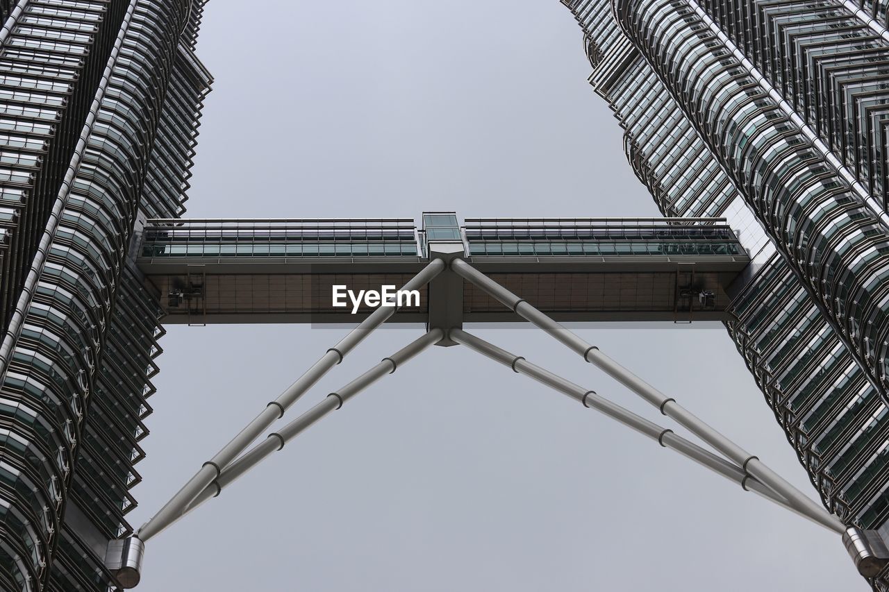 Low angle view of modern buildings against clear sky