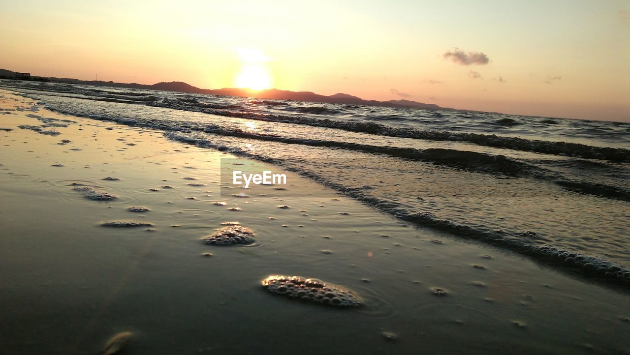 Scenic view of beach during sunset