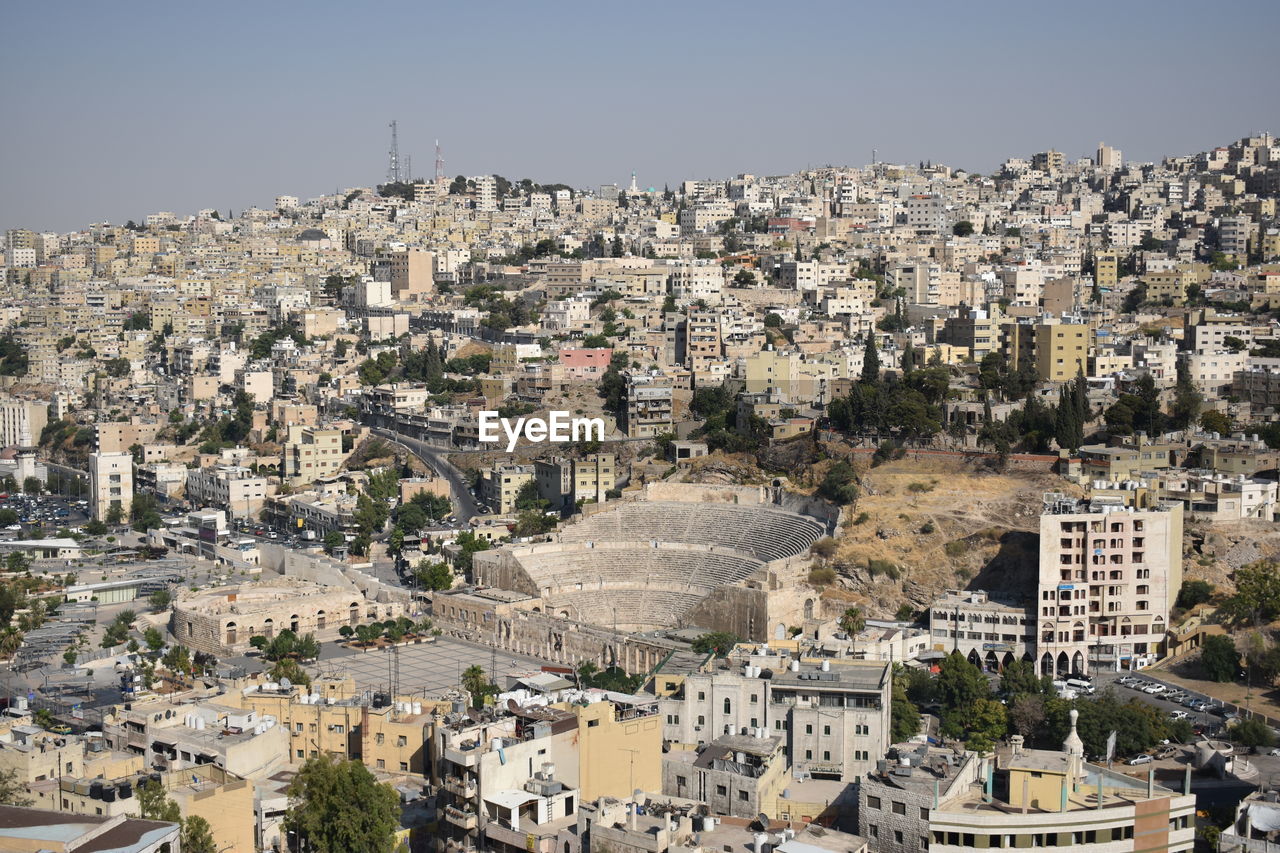 High angle view of townscape against clear sky in amman, jordan