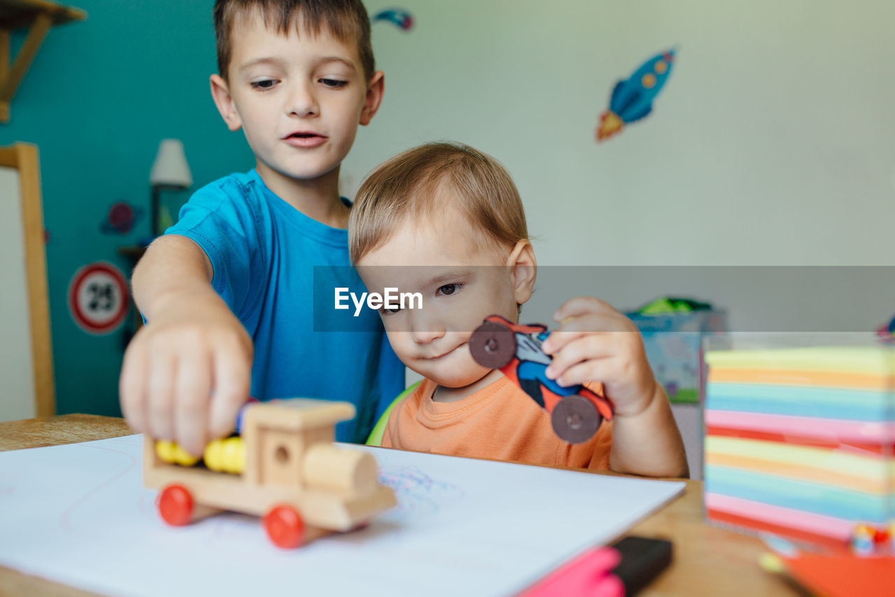 Boys playing at home