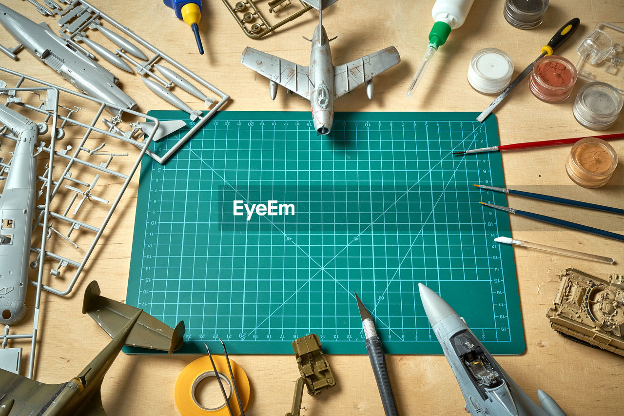 High angle view of toy with paintbrush on table