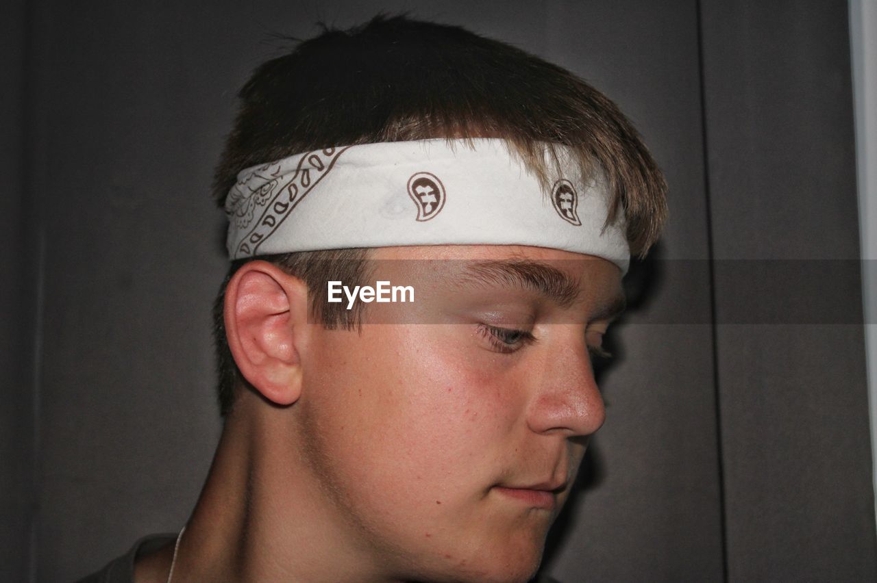 CLOSE-UP PORTRAIT OF A YOUNG MAN