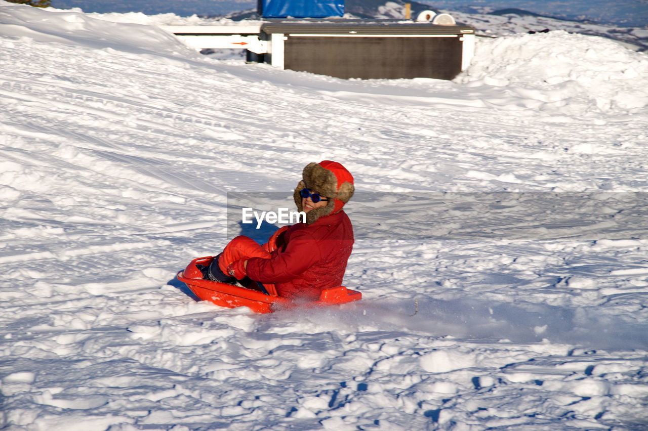 Man on snow covered field