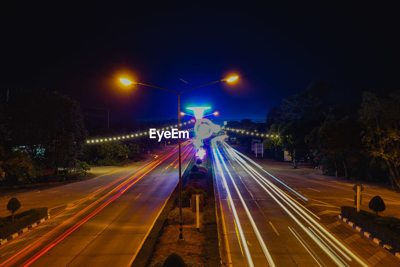 Light trails on road at night