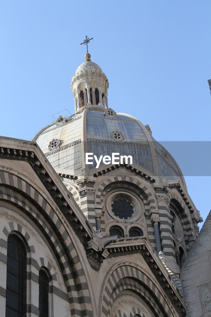 LOW ANGLE VIEW OF CHURCH AGAINST CLEAR SKY