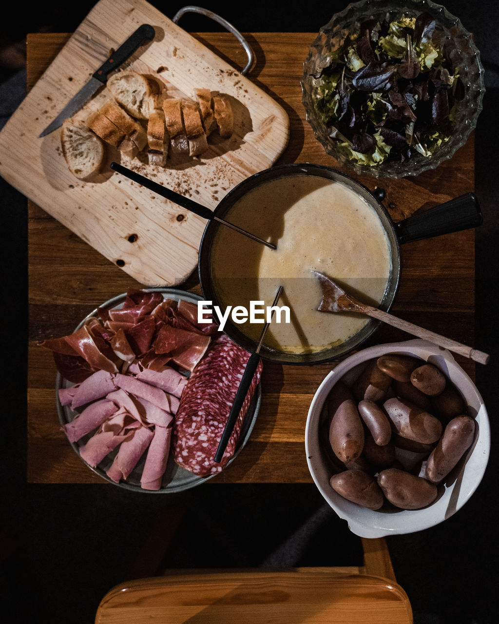 High angle view of food on table, fondue savoyarde