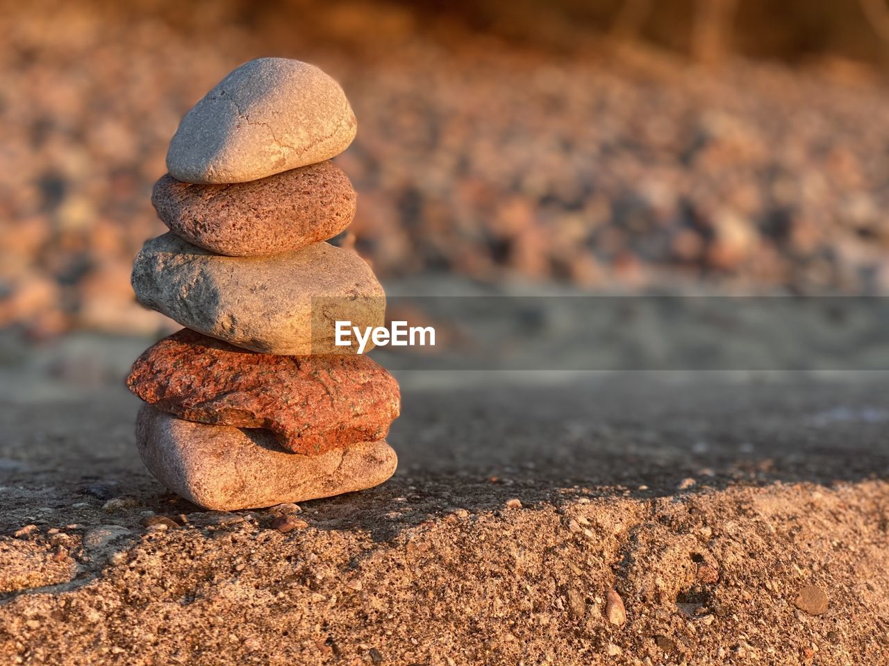 CLOSE-UP OF STONE STACK ON ROCKS