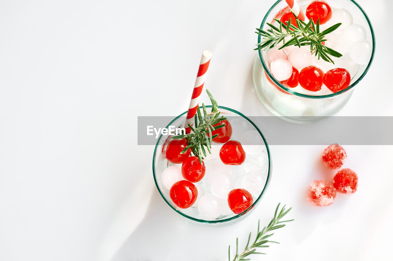 Christmas cranberry cocktail. refreshing alcoholic drink with berries for winter holidays party