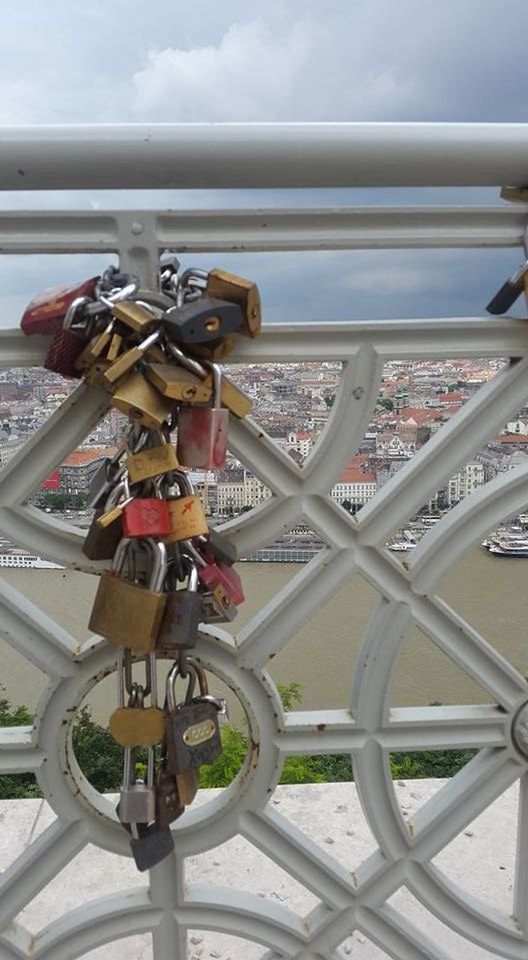 lock, padlock, security, protection, railing, love lock, metal, positive emotion, love, architecture, vehicle, day, bridge, built structure, emotion, water, no people, sky, transportation, outdoors, travel, travel destinations, nature, hanging, iron, city, tourism, cloud, hope, river