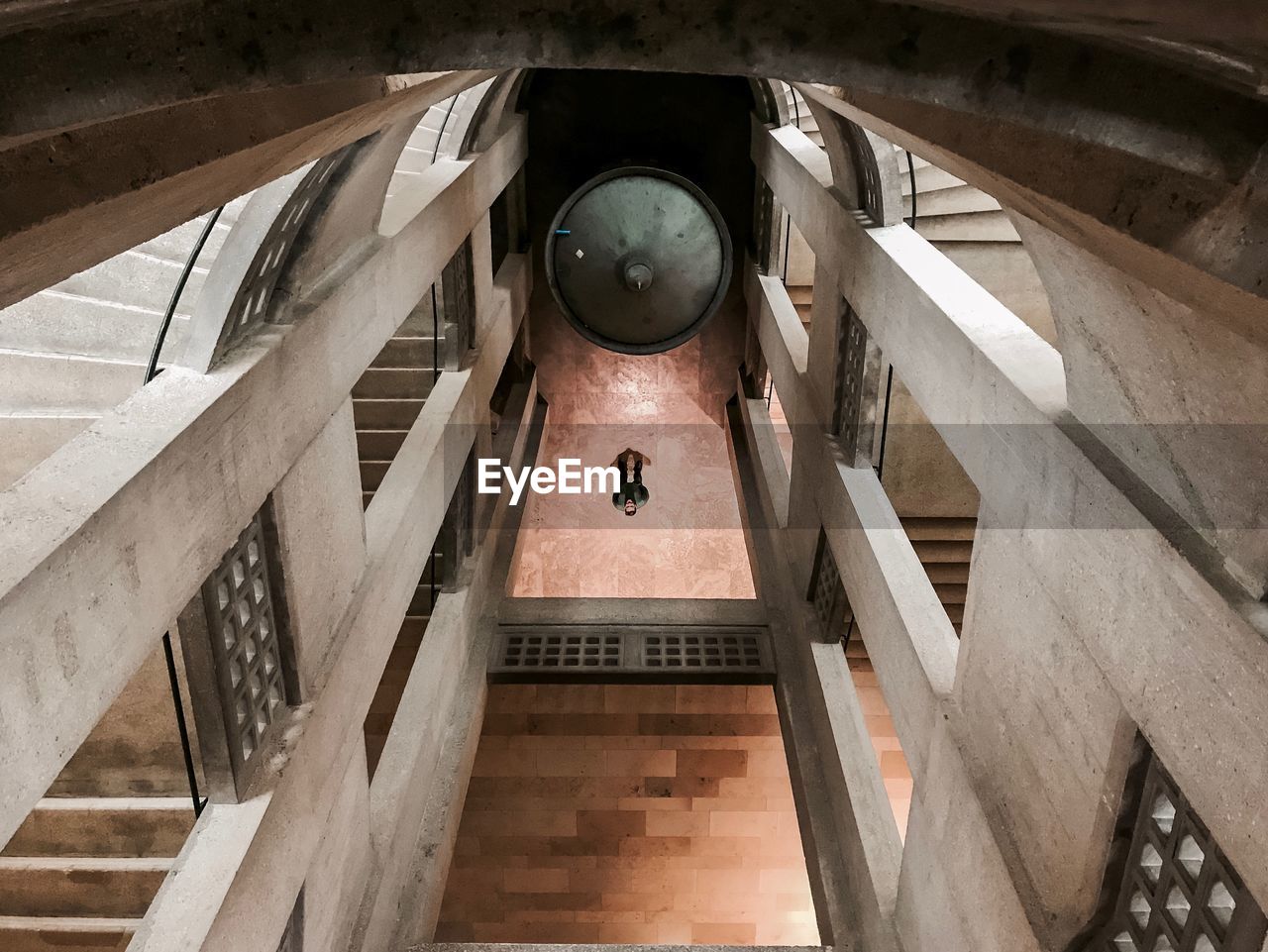 LOW ANGLE VIEW OF STAIRCASES IN BUILDING