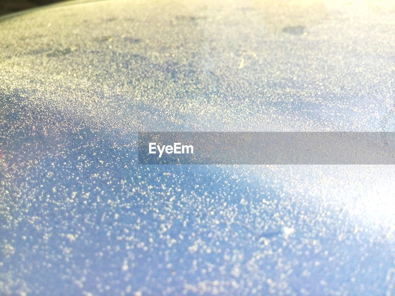 Full frame shot of frozen glass