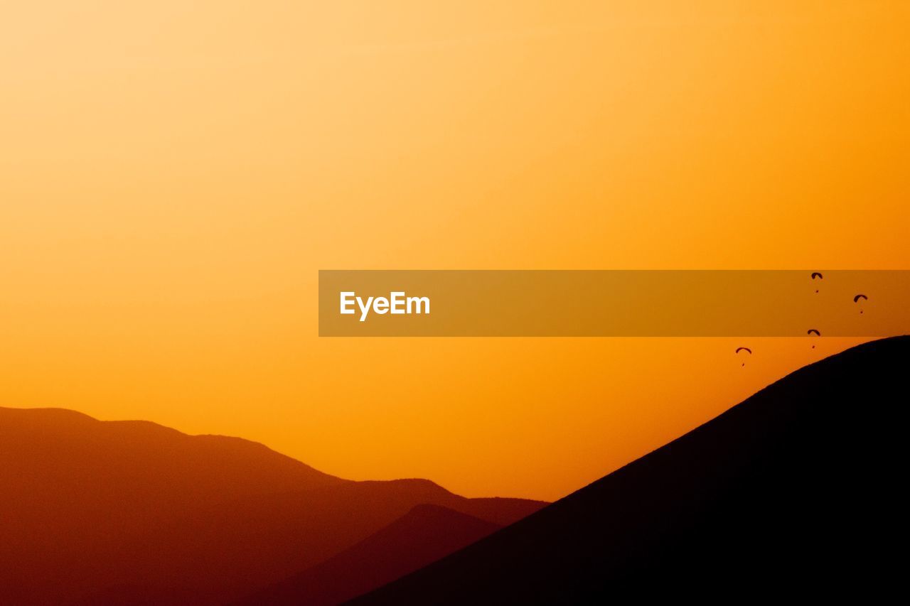 Silhouette of mountain at sunset