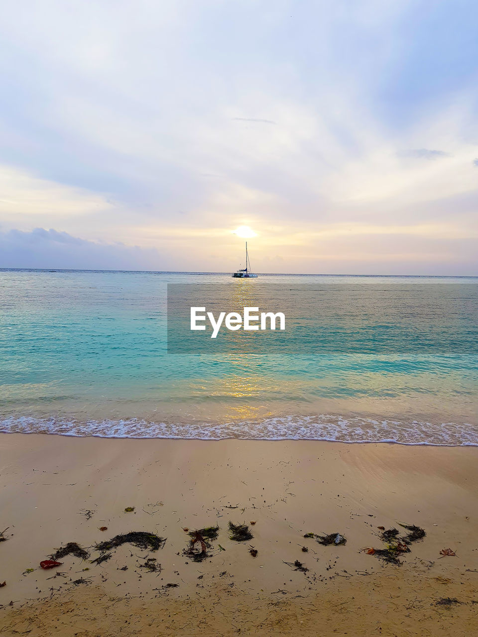 SCENIC VIEW OF SEA DURING SUNSET