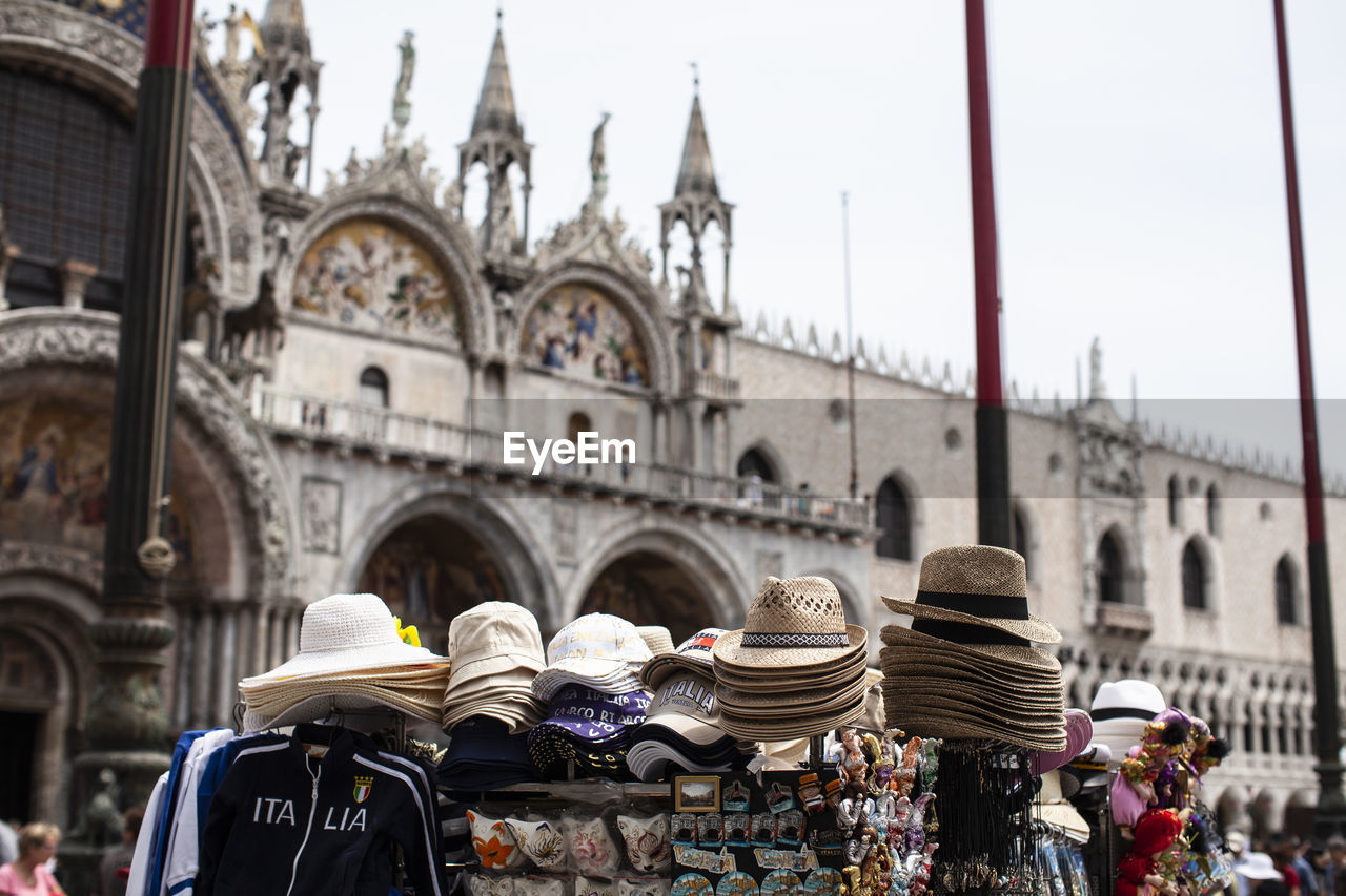 Low angle view of hats for sale in venice.