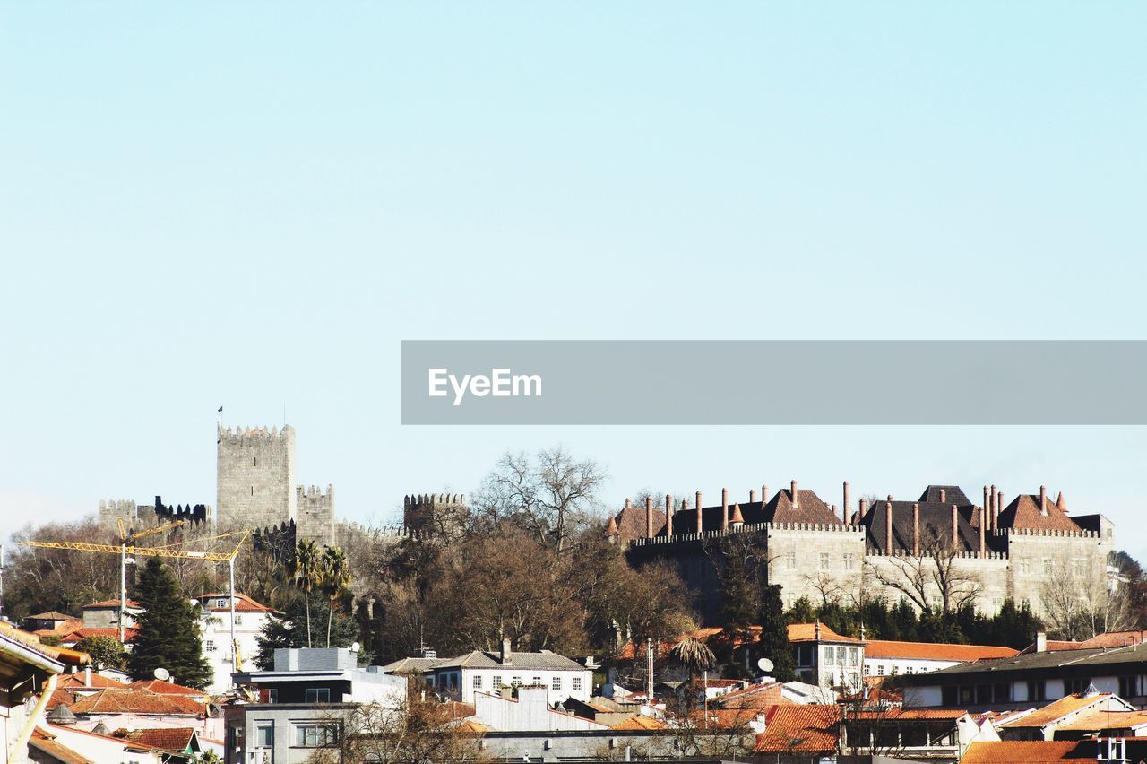 Cityscape against clear sky