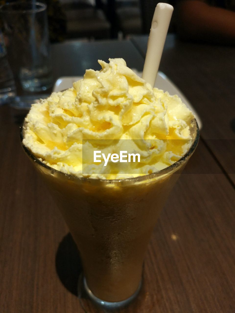 CLOSE-UP OF ICE CREAM IN GLASS