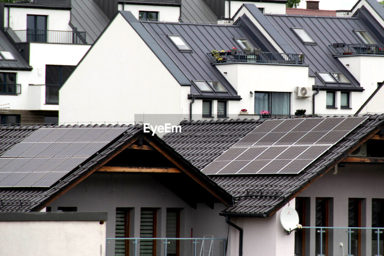 Installing a solar cell on a roof.