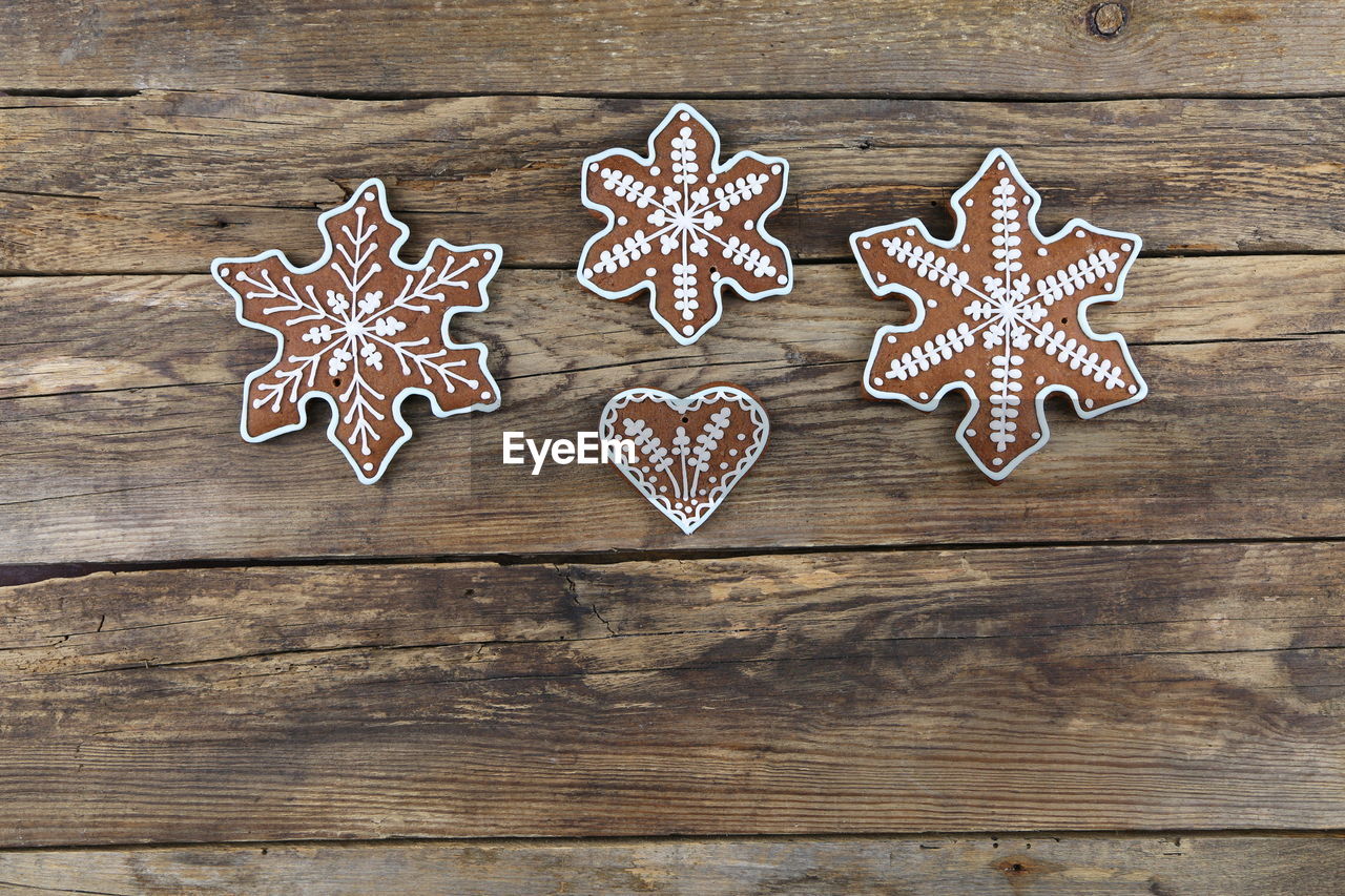 Close-up of gingerbread cookies on wooden table