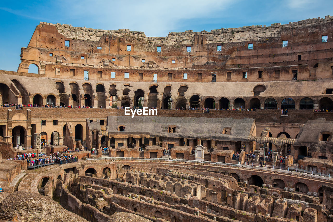 View of the seating areas and the hypogeum of the ancient colosseum in rome