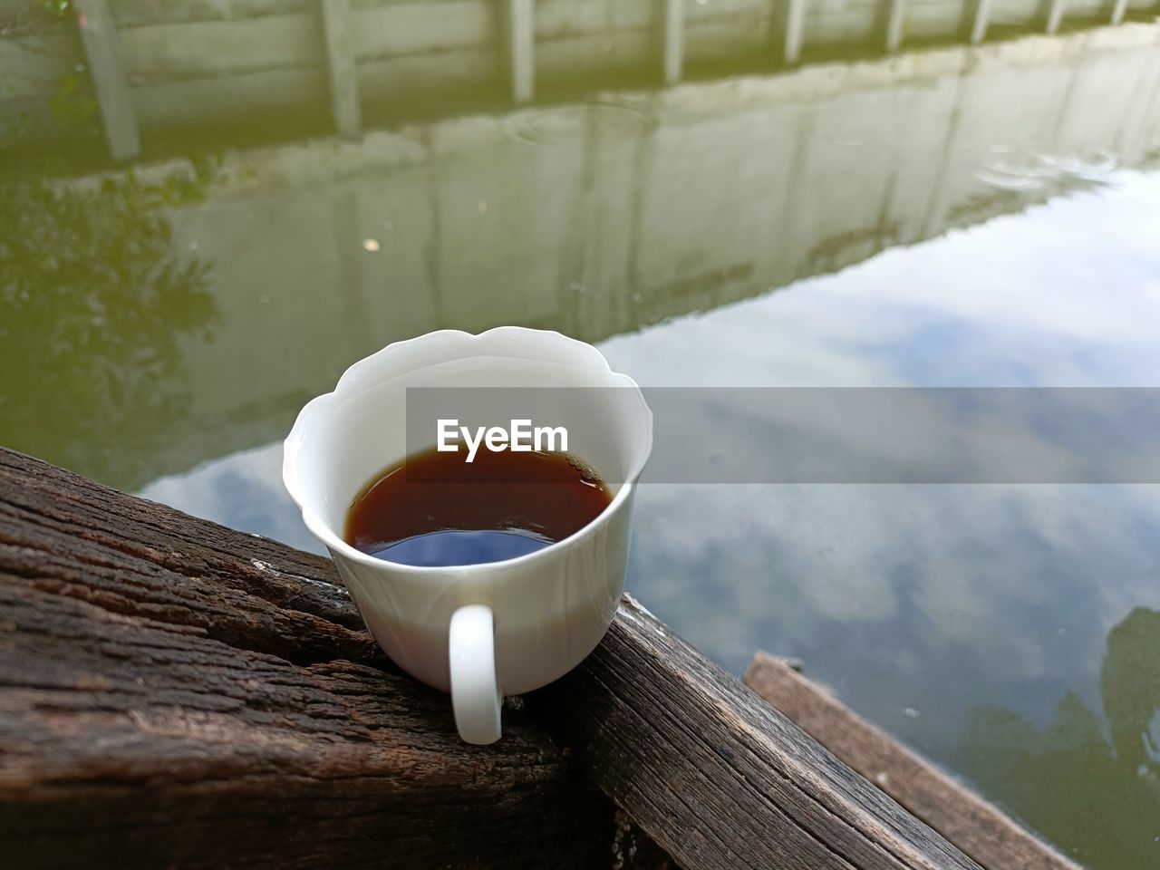 drink, food and drink, refreshment, tea, cup, mug, hot drink, water, wood, tea cup, morning, nature, relaxation, no people, food, assam tea, coffee, day, freshness, wellbeing, outdoors, table, tranquility, high angle view, crockery, reflection