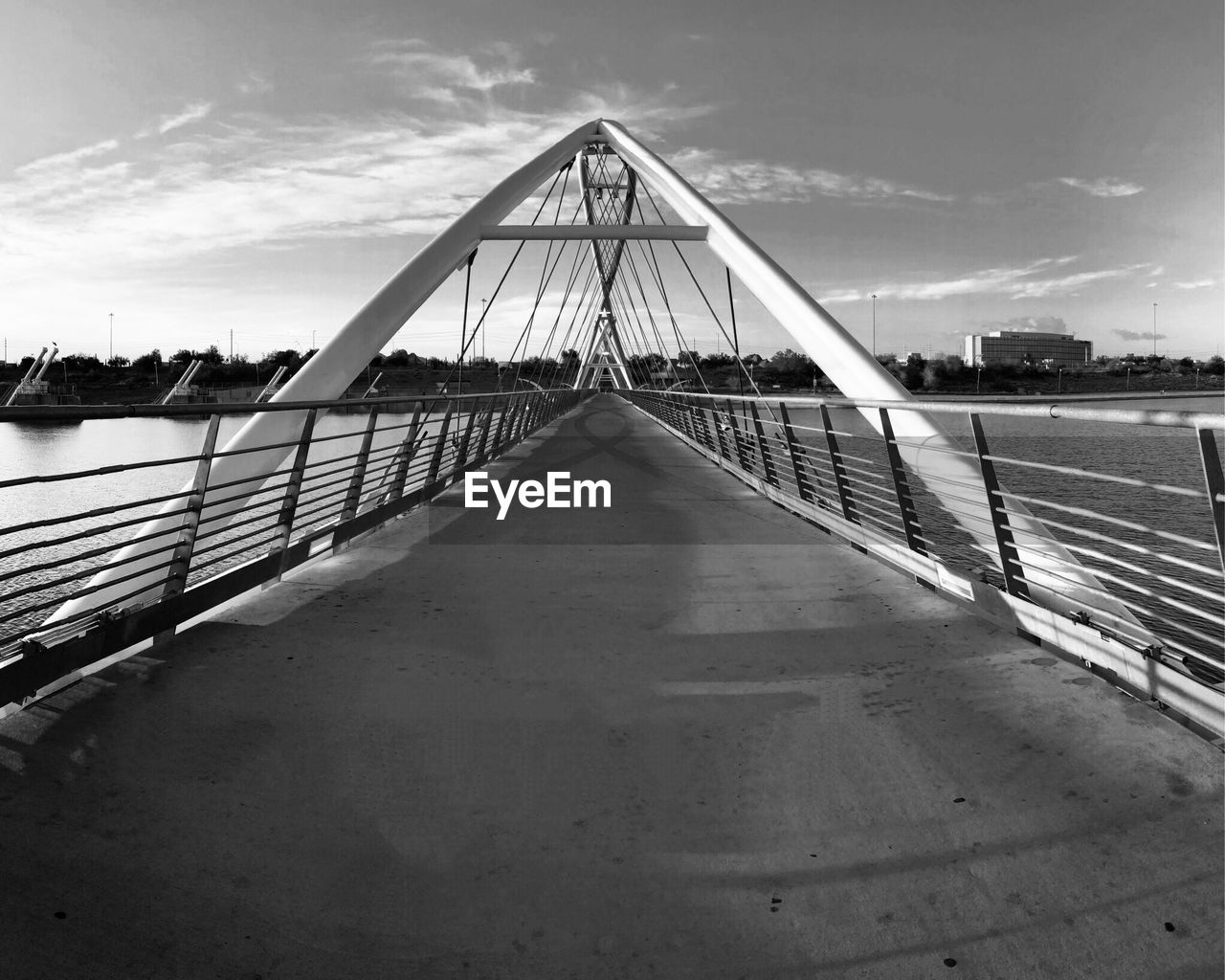 View of bridge over river against sky 