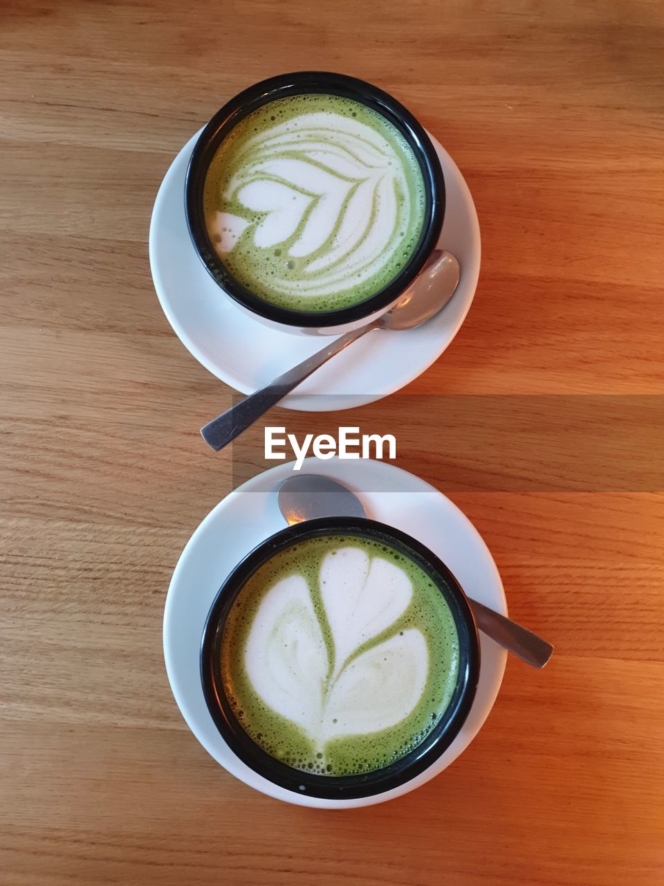 DIRECTLY ABOVE SHOT OF COFFEE IN CUP ON TABLE