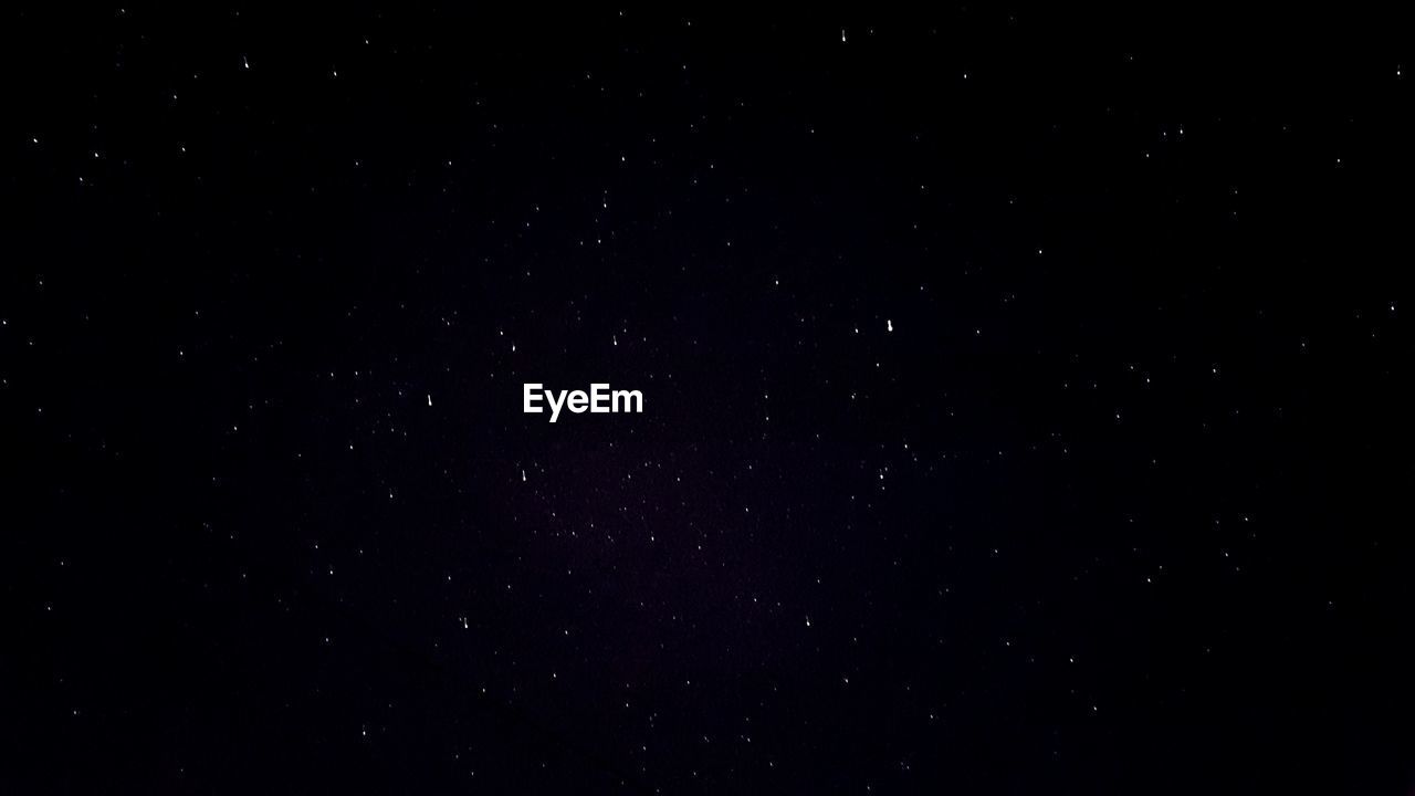 LOW ANGLE VIEW OF STARS IN SKY AT NIGHT