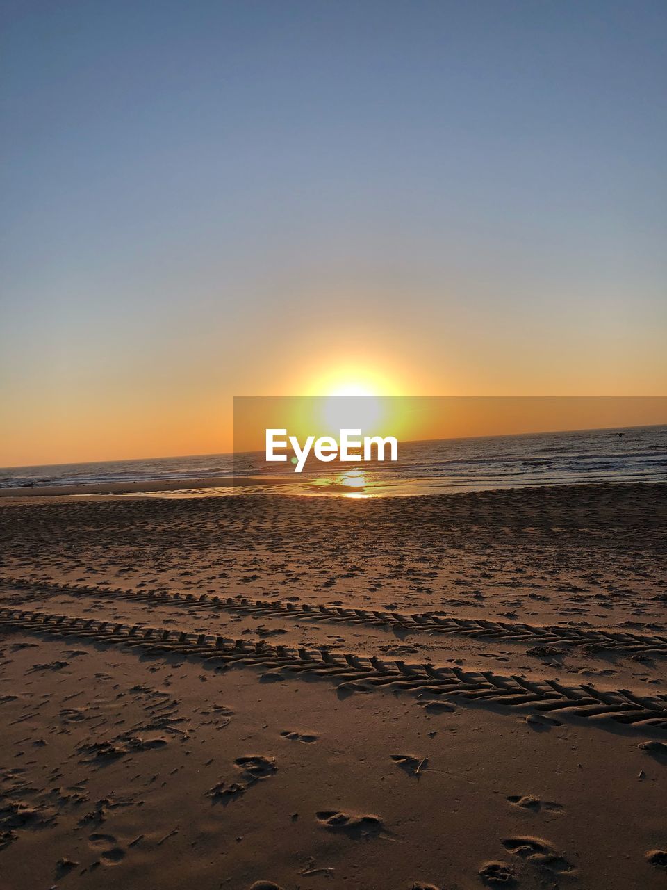 SCENIC VIEW OF SEA DURING SUNSET