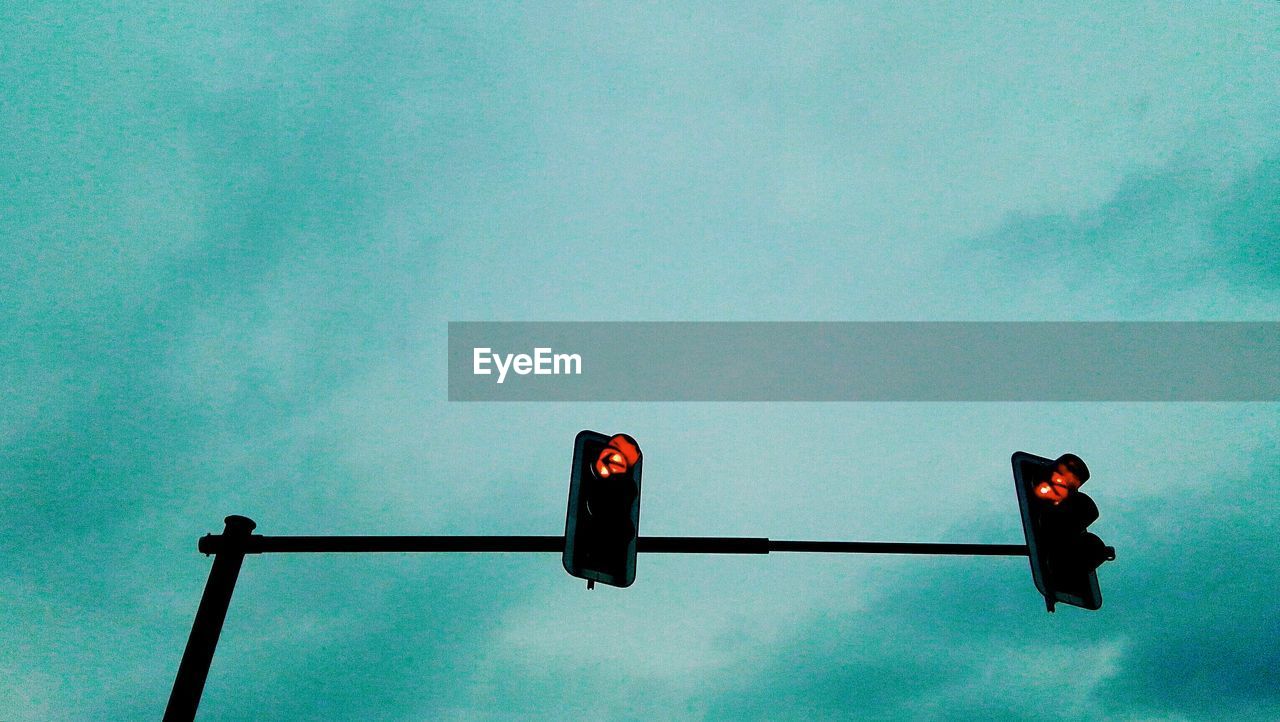 LOW ANGLE VIEW OF ROAD SIGNAL