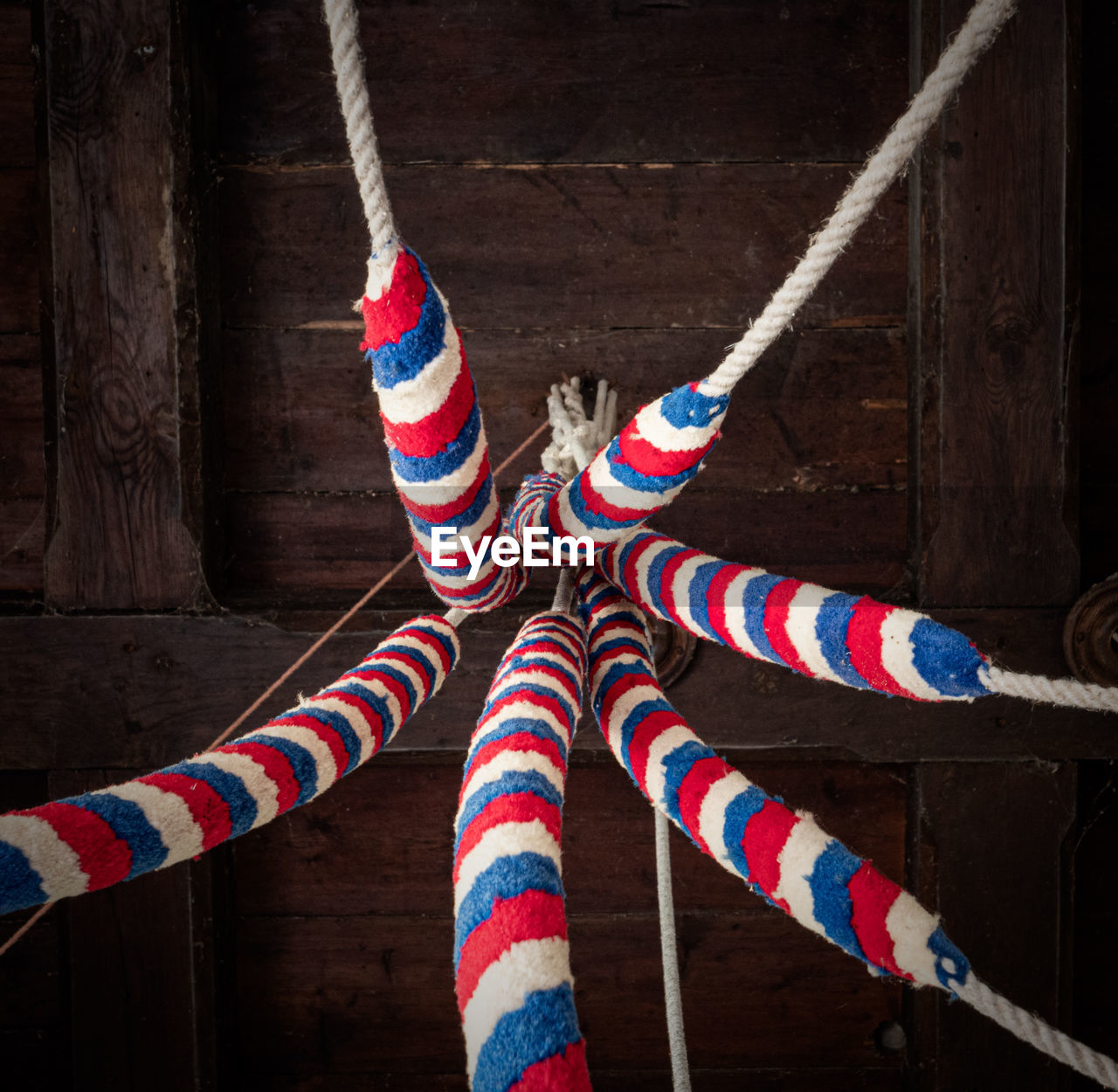 CLOSE-UP OF CLOTHES HANGING ON ROPE