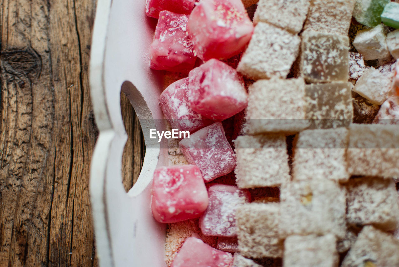 Close-up of colorful dessert in tray on table