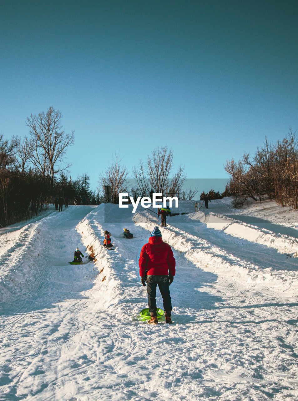 Man skiing on snow covered landscape