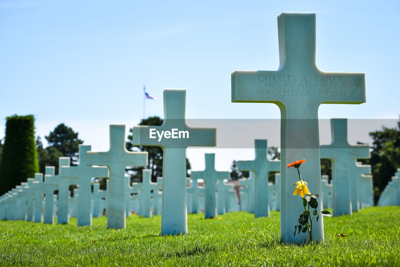 VIEW OF CROSS ON CEMETERY