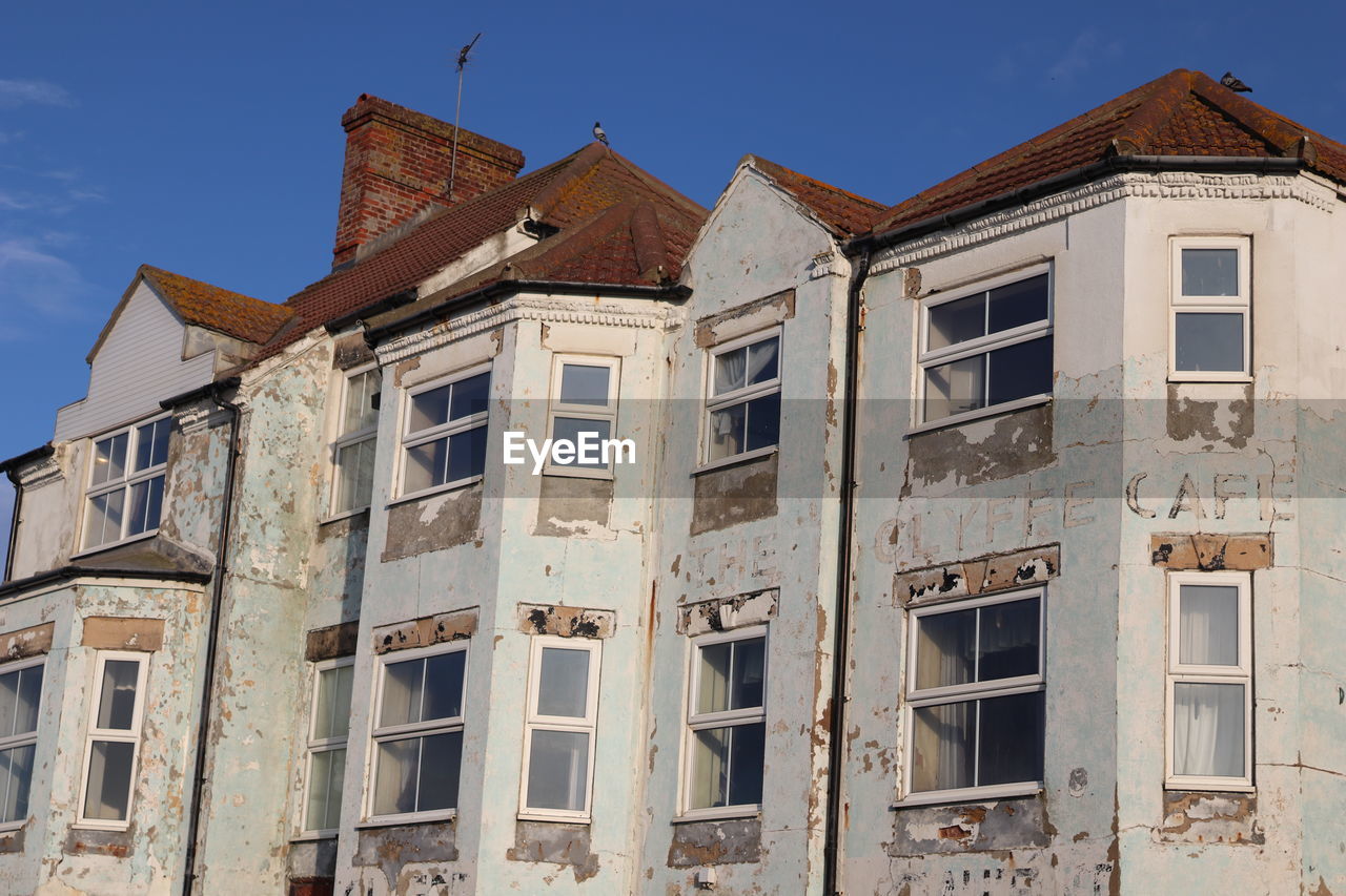 Low angle view of old building against sky