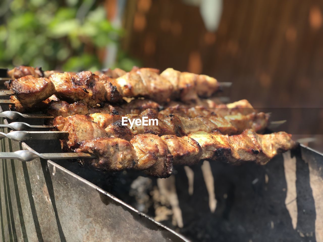 Close-up of meat on barbecue grill