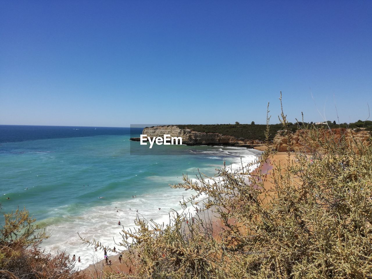 Scenic view of sea against clear sky