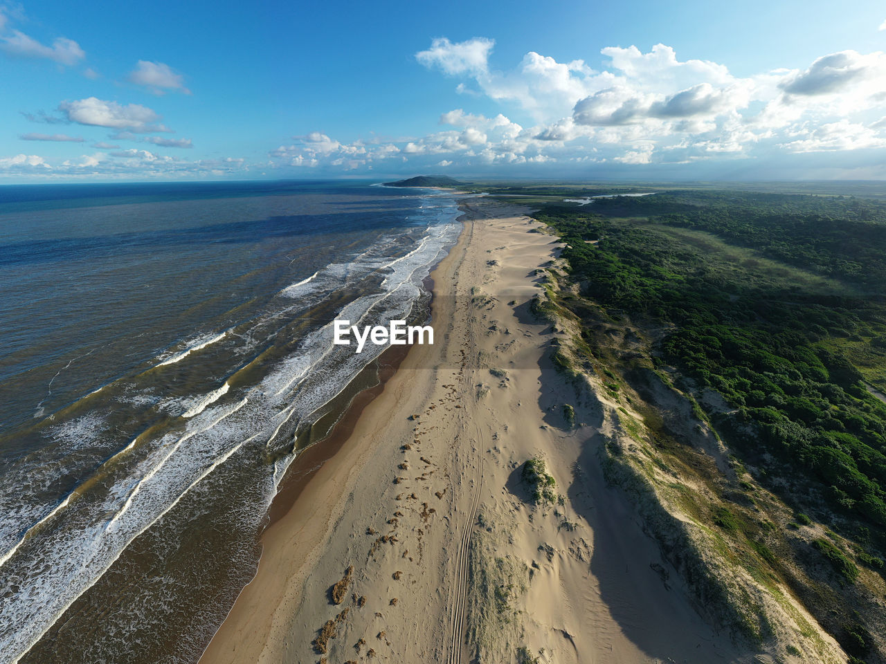 Aerial view of beach against sky