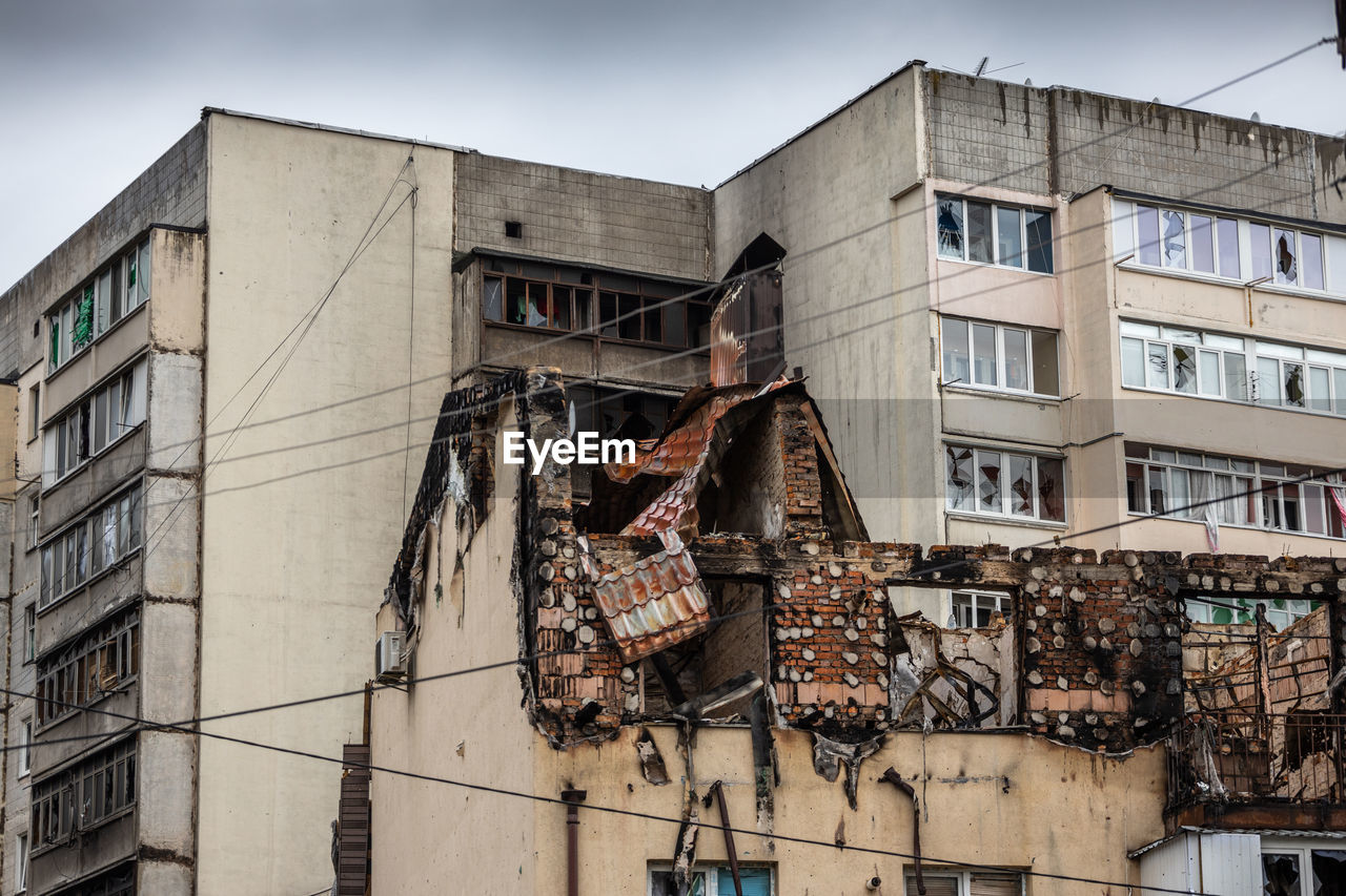 Destroyed buildings on the streets of irpen. buildings after being hit by missiles.