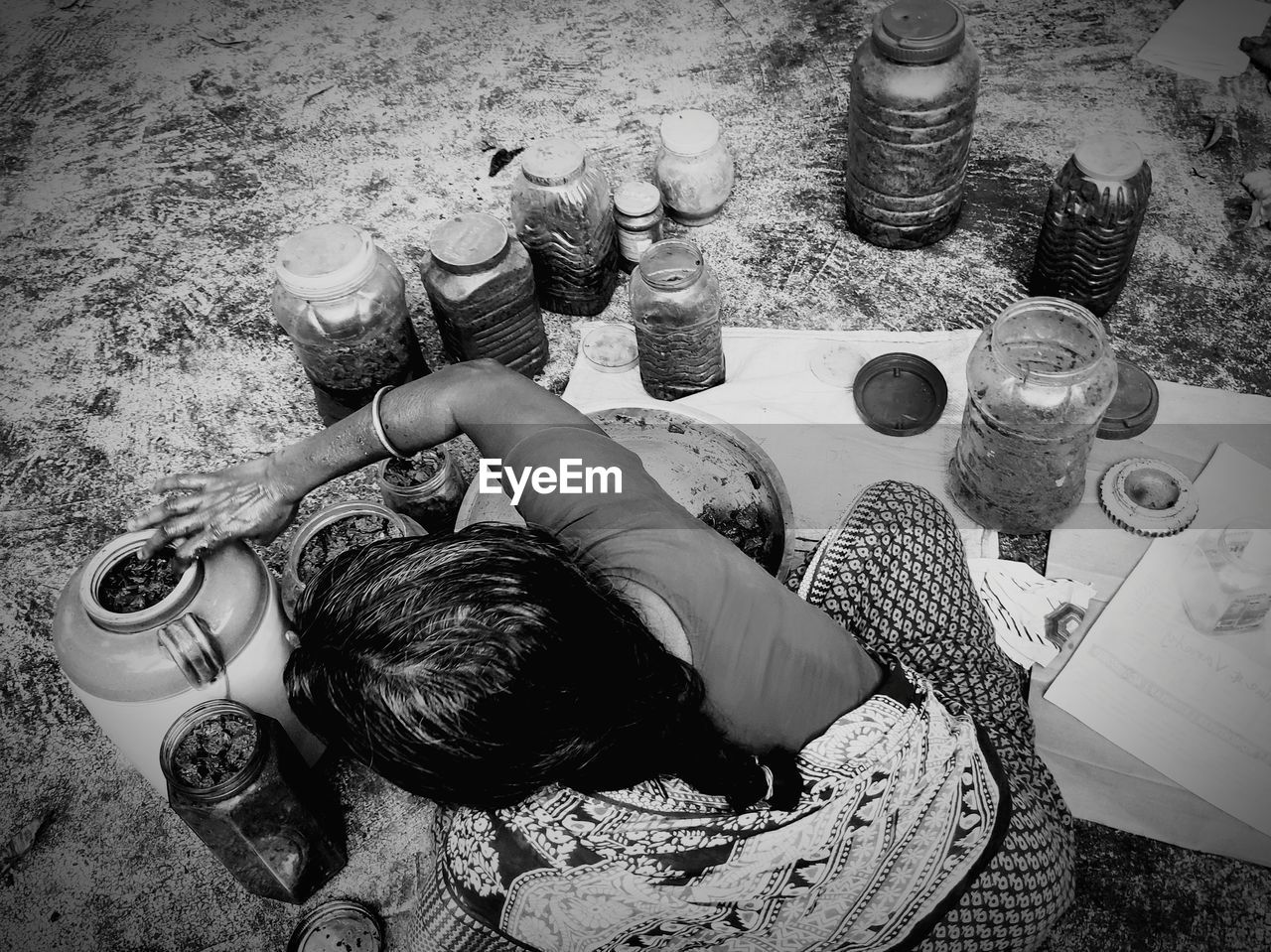 High angle view of woman preparing food outdoors