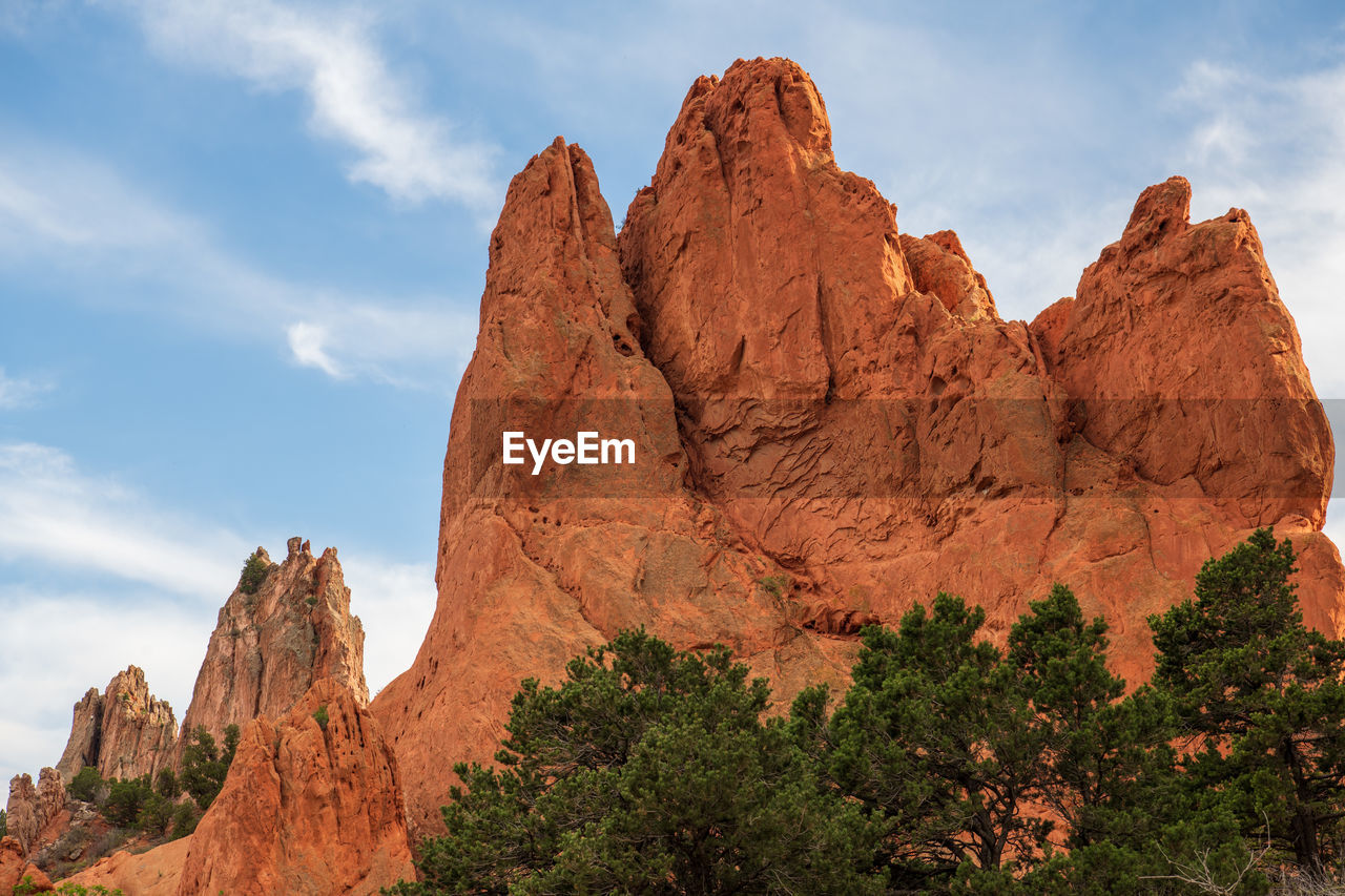 Panoramic view of rock formations against sky