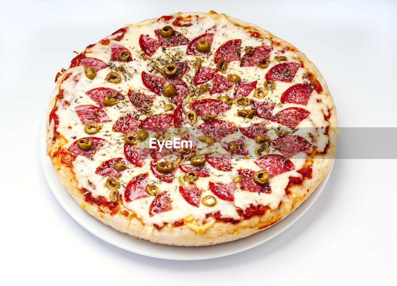 High angle view of pizza on white background