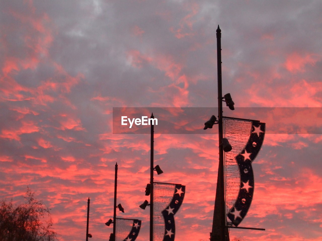 Low angle view of cloudy sky at sunset