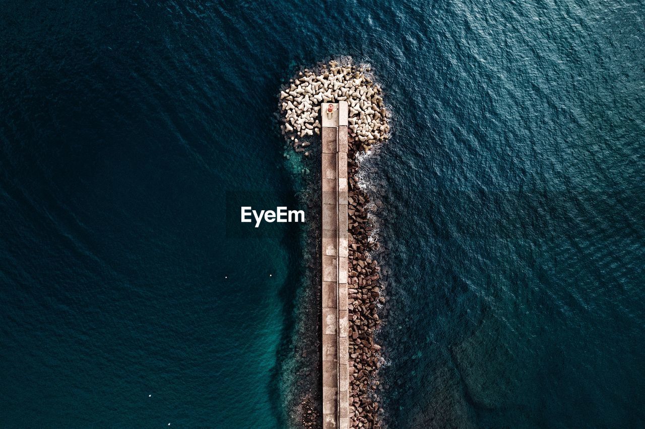 Directly above shot of pier in sea